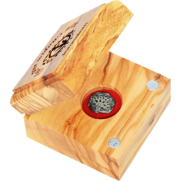 The poor Widow's Mite coin in an opened olive wood Box