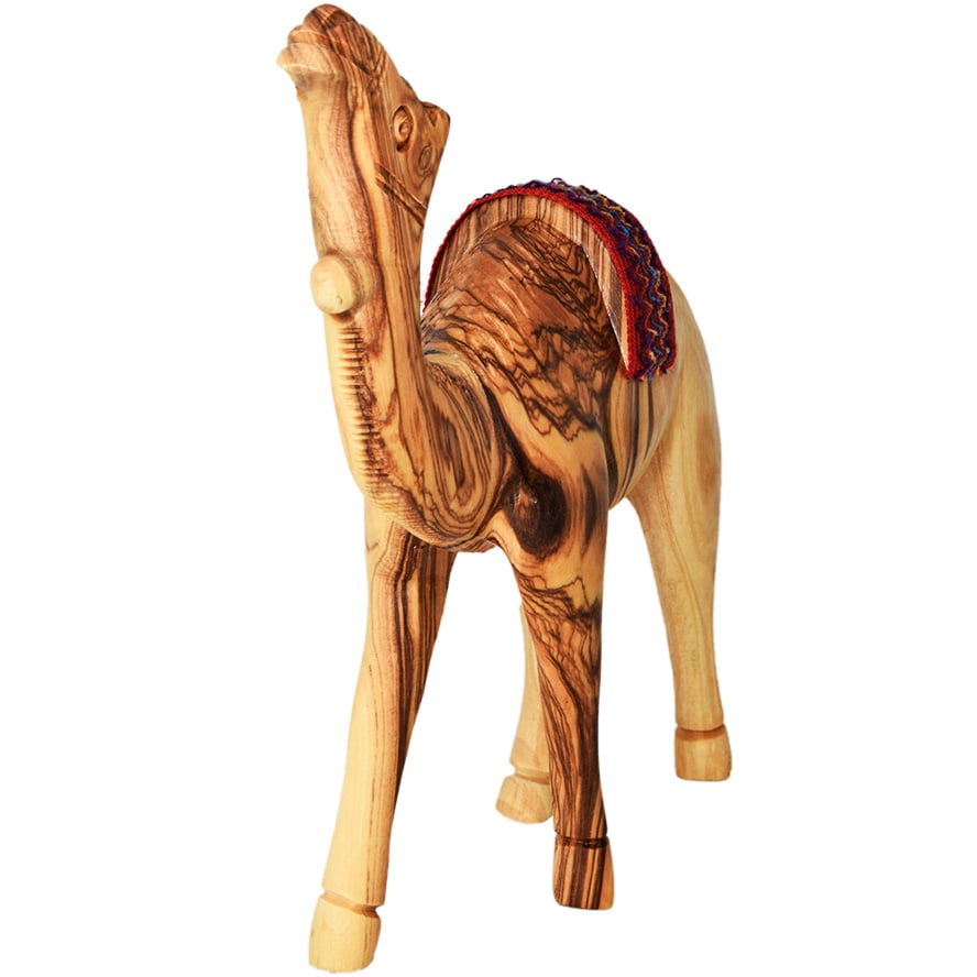 Olive Wood Camel with Bedouin Saddle – Made in the Holy Land – 6″ (front view)
