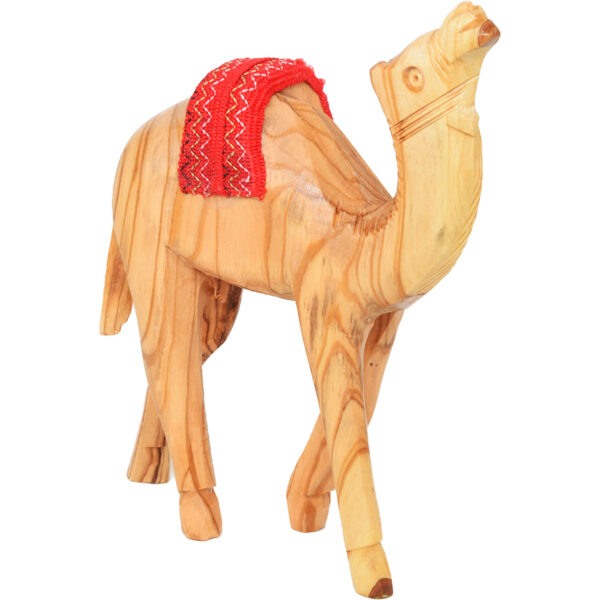 Carved wooden camel with saddle from Israel