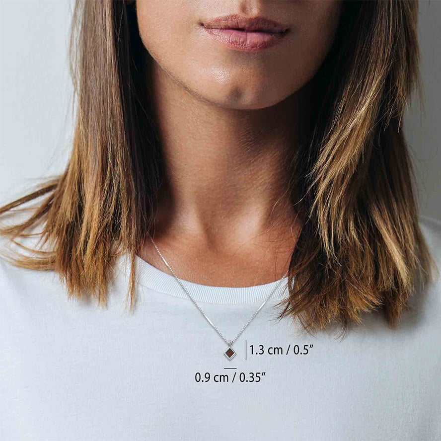 Nano Bible inside a Sterling Silver ‘Rhombus’ Necklace – Made in Israel (worn by model)